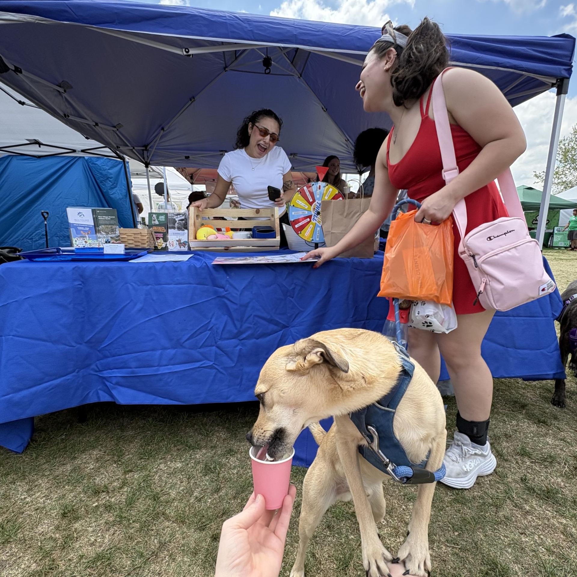 Bark in the Park RVAH Booth 3 Dog enjoys pup cup