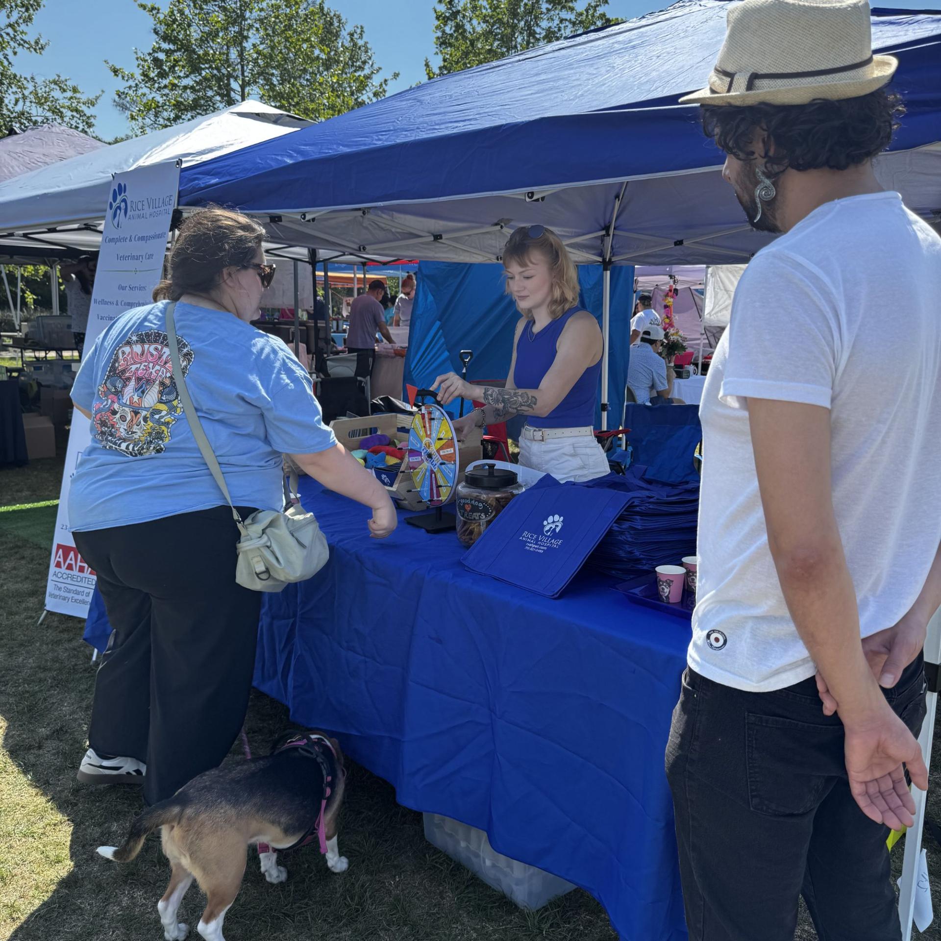 Bark in the Park RVAH Booth Katie spinning the wheel